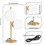 Lampe à poser dorée | Globe en verre blanc, 2 formats