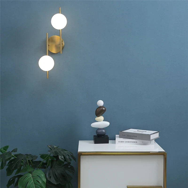 Applique Astra | Doré géométrique, 1 ou 2 globes dépolis