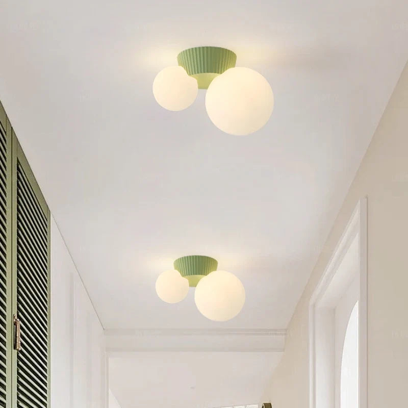 Plafonnier Luméa | Double globe en verre, 4 coloris