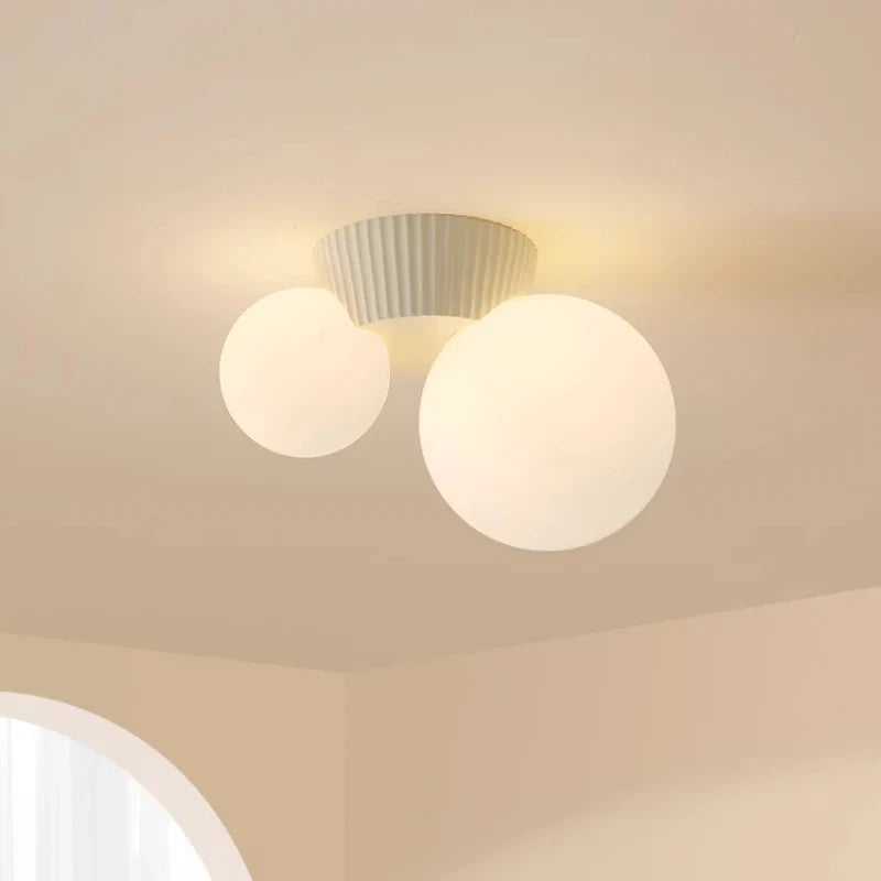 Plafonnier Luméa | Double globe en verre, 4 coloris