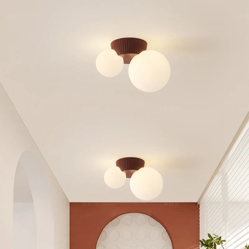 Plafonnier Luméa | Double globe en verre, 4 coloris