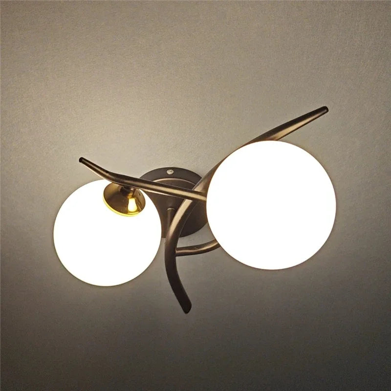 Applique Lunara | Arc à globes opalins, droite ou gauche